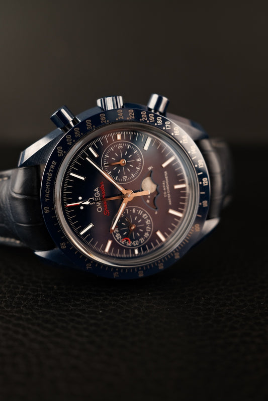 Omega Speedmaster Moonphase 30493445203001 Box + og. Papiere Blue Side Of The Moon, incl. Second Omega Strap