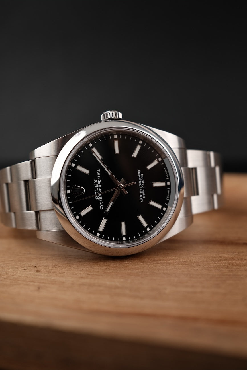 Rolex Oyster Perpetual 39  114300 Box + og. Papiere Black Dial