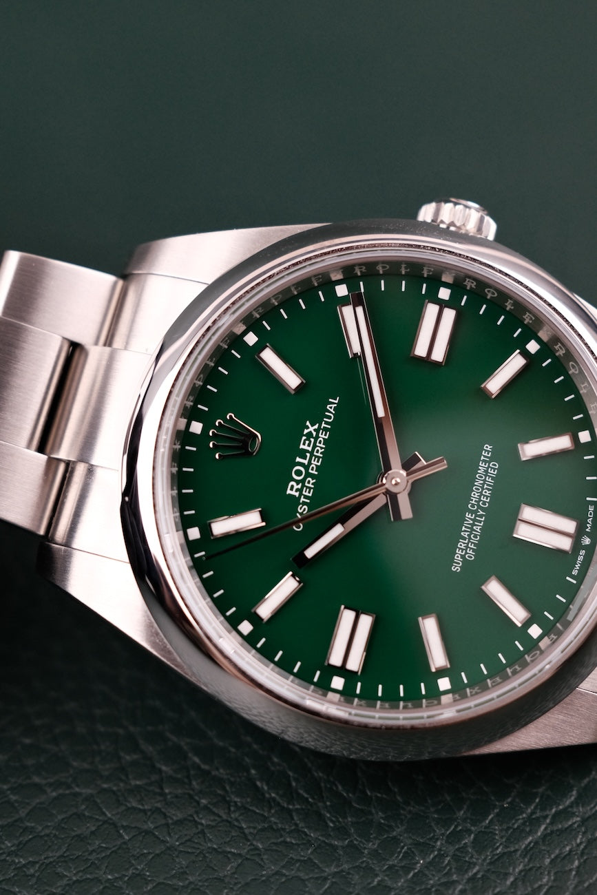 Rolex Oyster Perpetual 41 124300 Box + og. Papiere Green Dial, 41mm