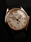 Bild in Galerie-Betrachter laden, Patek Philippe Annual Calendar 5035R Original Papiere Rose Gold Cream Dial Additional Extract
