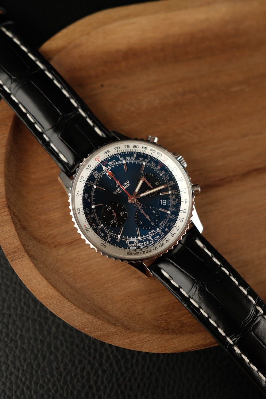 Breitling Navitimer 1 B01 Chronograph AB0121211C1P1 Box + og. Papiere blaues Zifferblatt